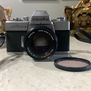Minolta 35mm Film Camera w/Lens, Strap, and Filter